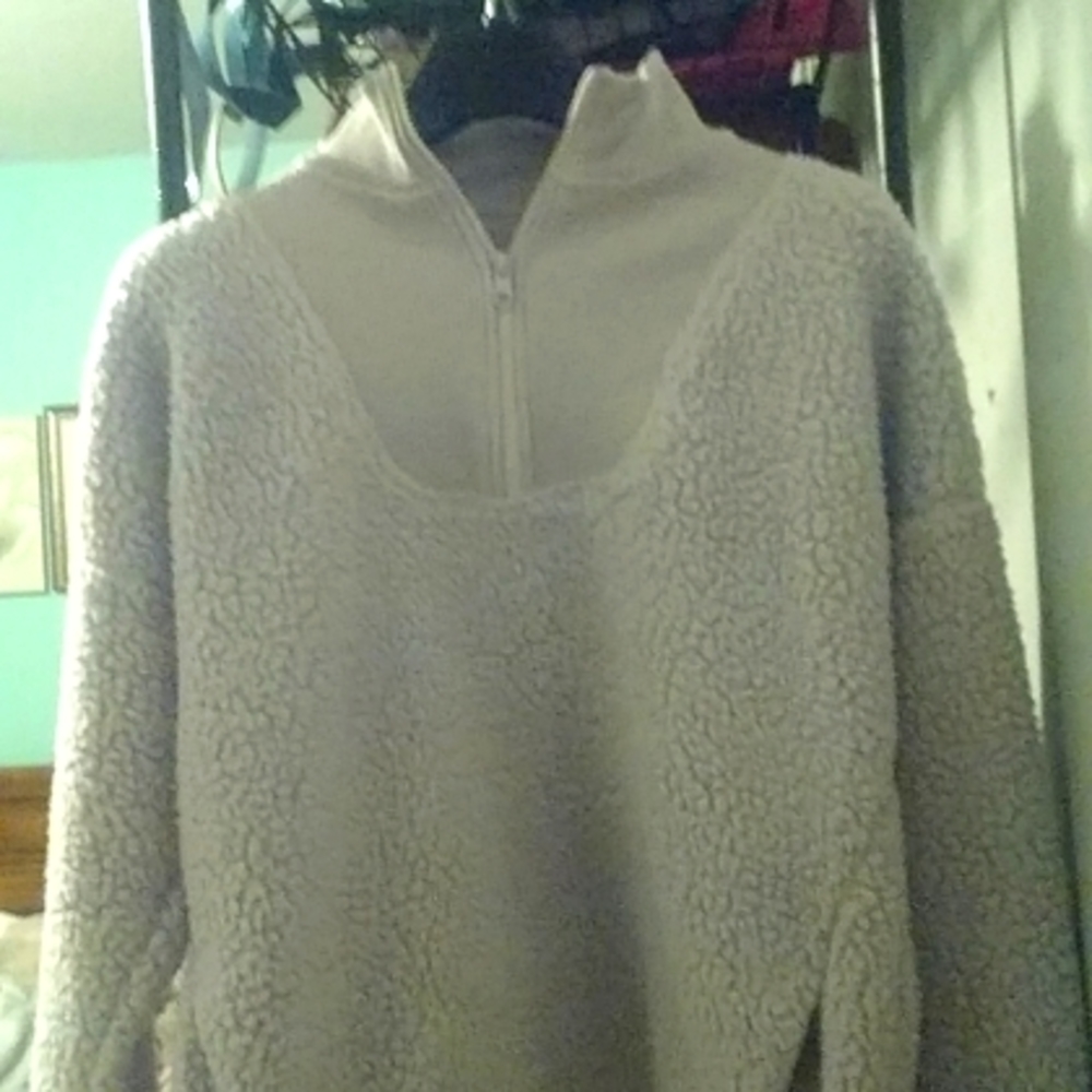A lavender oversized Sherpa extended crew neck hoodie.